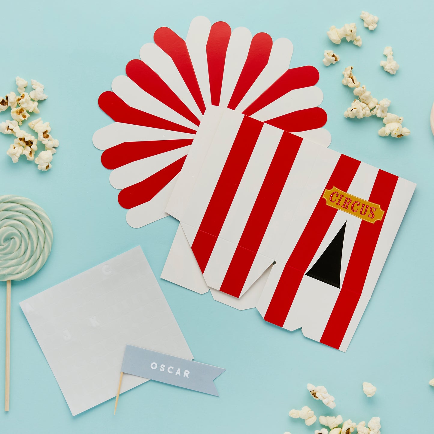 Circus themed customisable party favour boxes with red and white circus tent design
