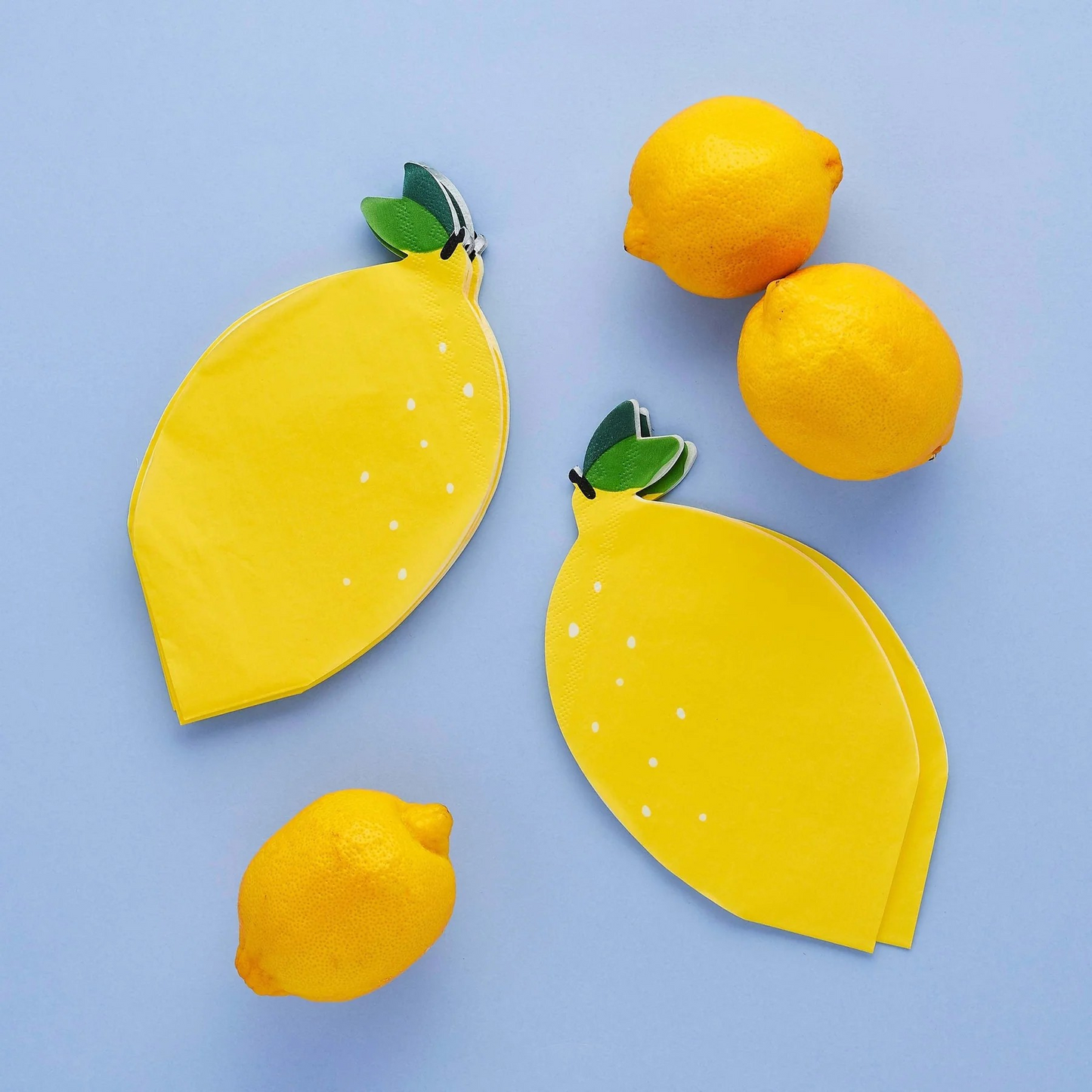 Lemon shaped paper napkins with green leaf detail