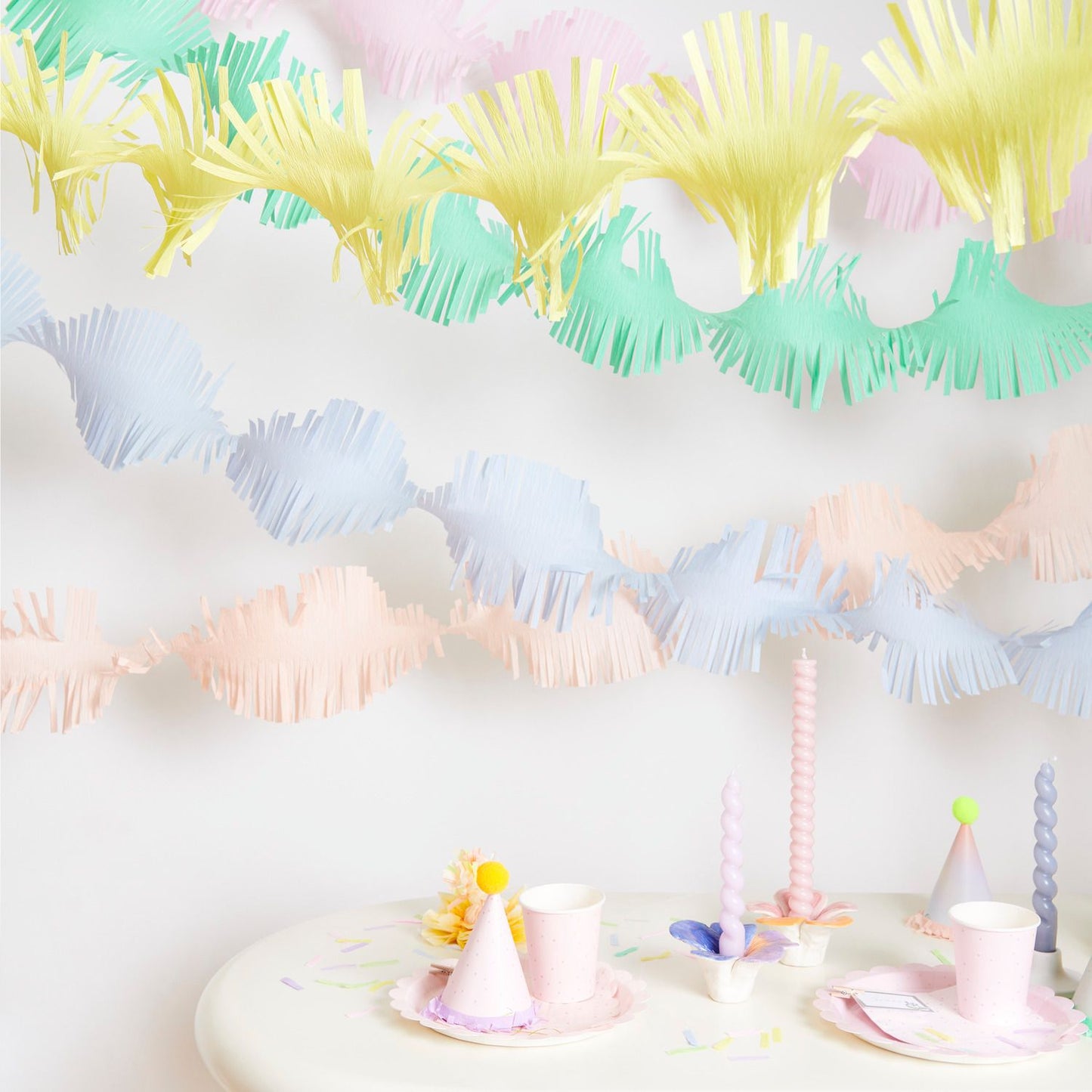 Twisty paper streamers can create beautiful ceiling decorations or a perfect party backdrop