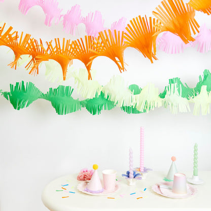 Rainbow Twisty paper streamers can create beautiful ceiling decorations or a perfect party backdrop