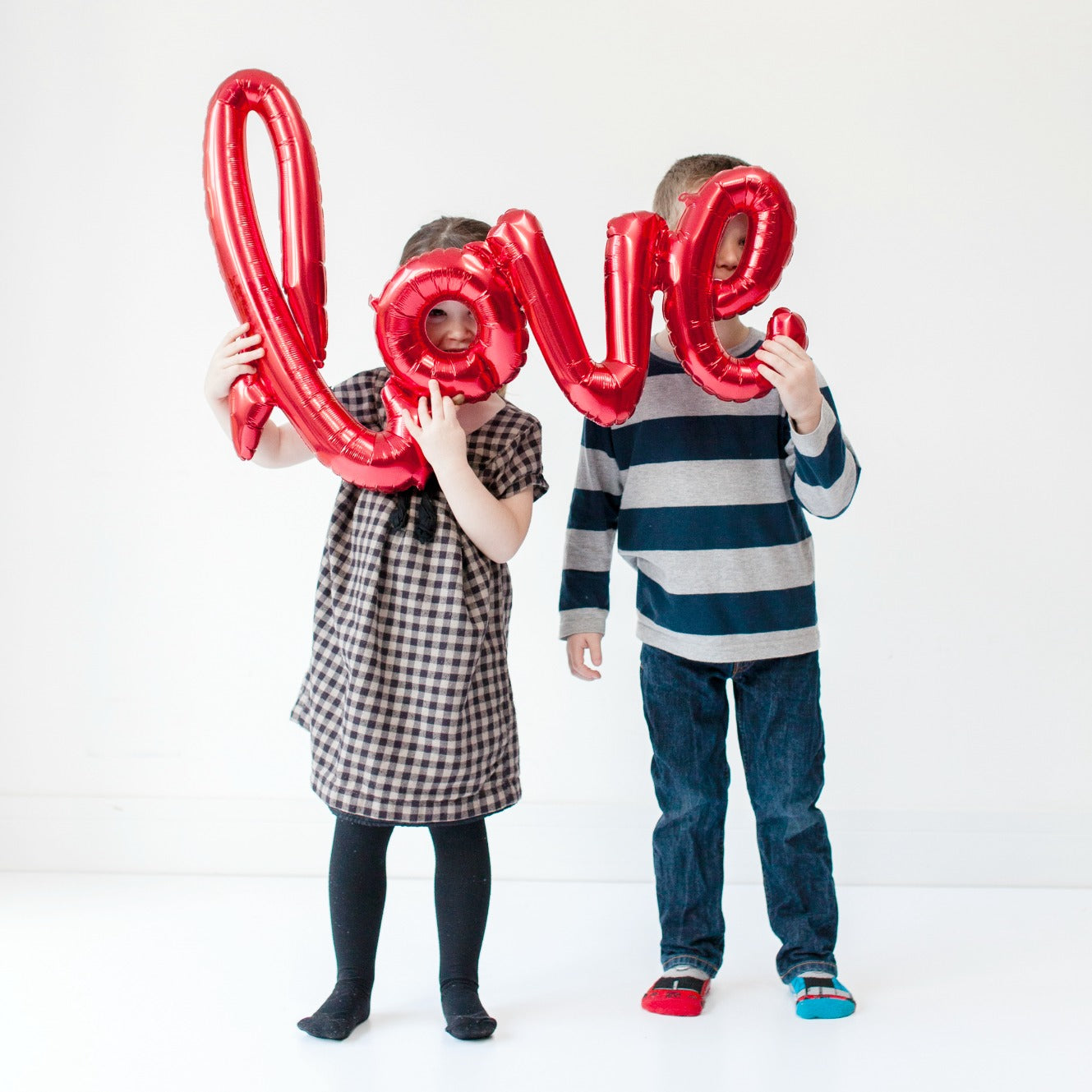 Red foil “LOVE” balloon — modern Valentine’s Day decoration