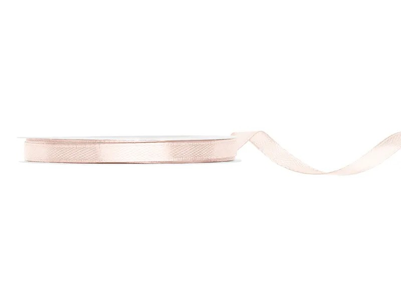 Blush satin ribbon on a white background