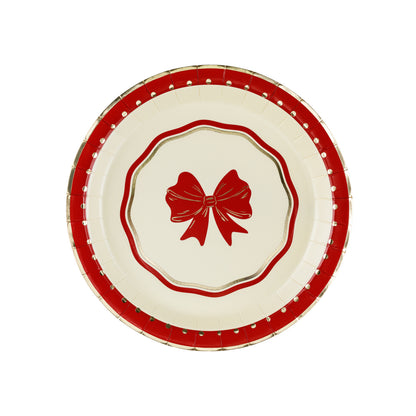 Small cream and red bow paper plates with gold edging