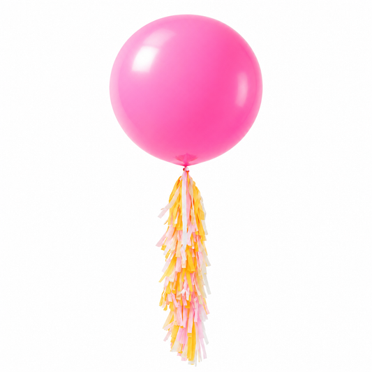 Pink balloon with colorful tassels on a white background
