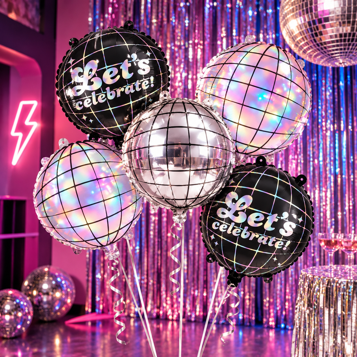 Set of five silver, holographic and black disco ball foil balloons including Let's Celebrate balloons.