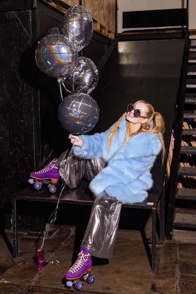 Set of five silver, holographic and black disco ball foil balloons including Let's Celebrate balloons.