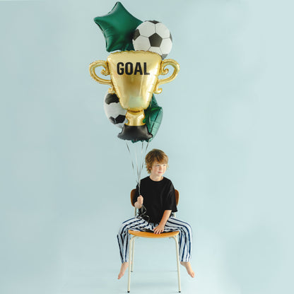 Football foil balloon bouquet with gold GOAL trophy, black and white footballs and green star balloons