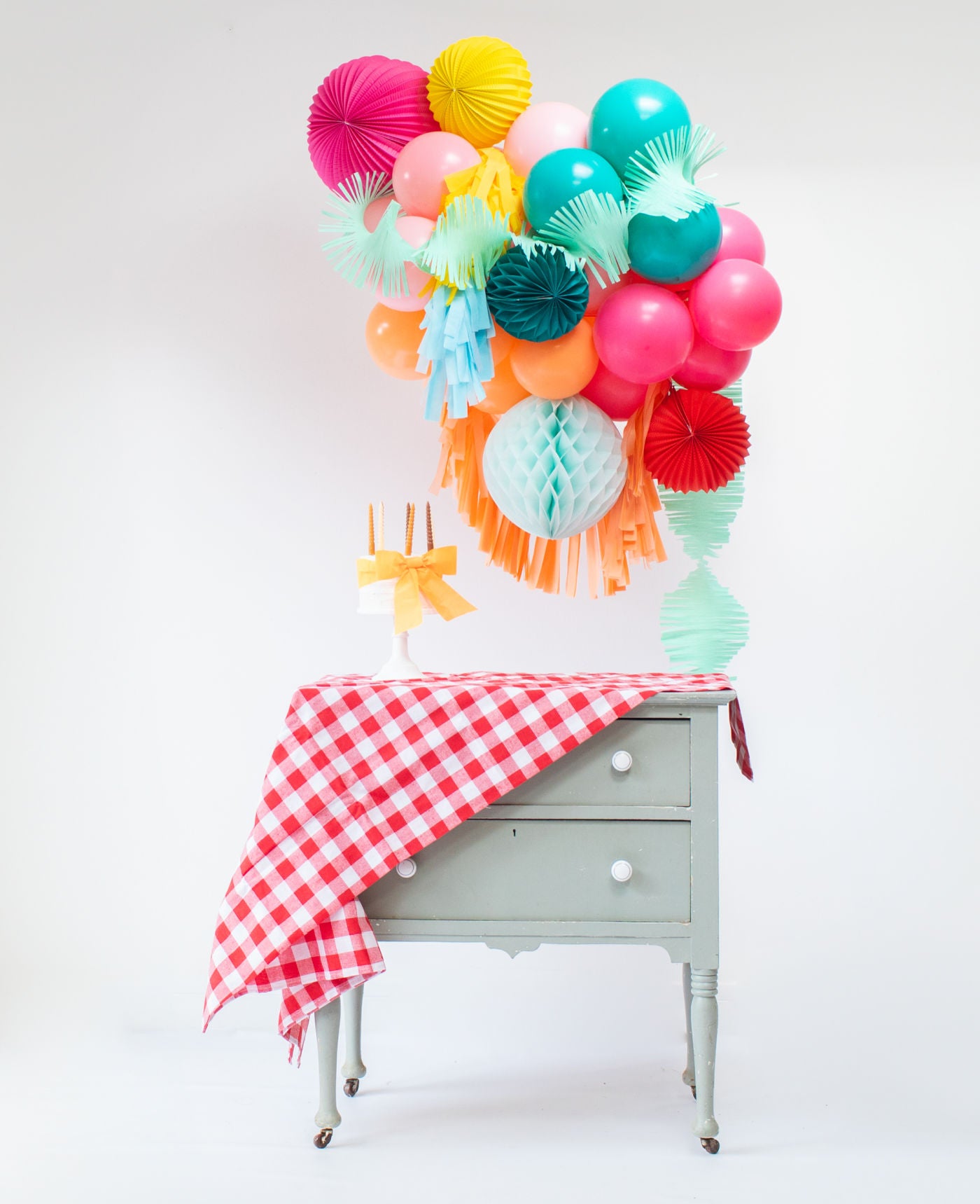 Fun And Bright Birthday Decorations combine Balloons and paper decor