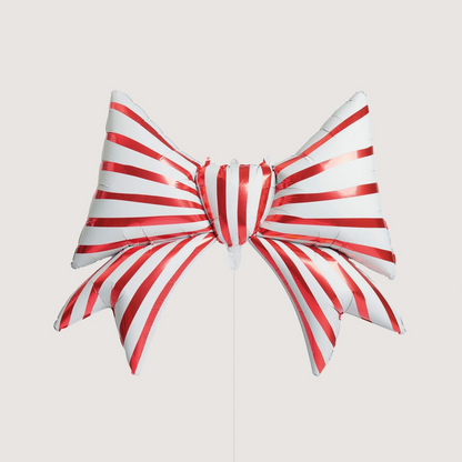 Red and white striped foil balloon in bow shape for Christmas Parties