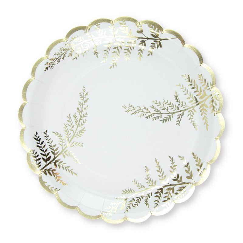 White paper plate with gold leaf patterns on a white background perfect Christmas Tableware
