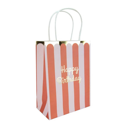 Gift bag with red and white stripes and 'Happy Birthday' text on a white background