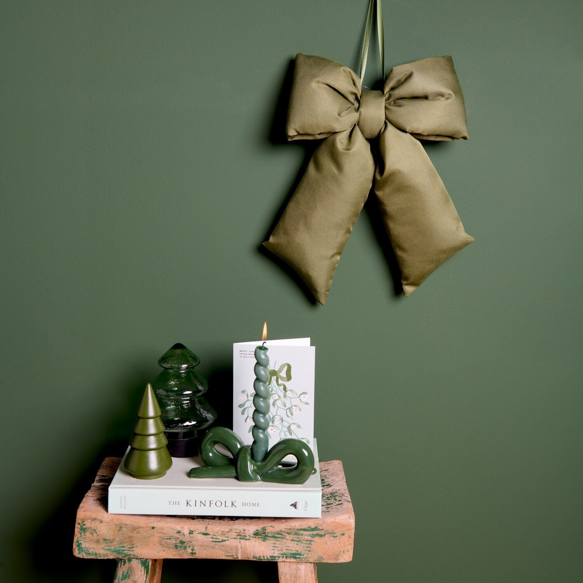 Large olive green fabric bow with long tails for indoor and outdoor Christmas decorating