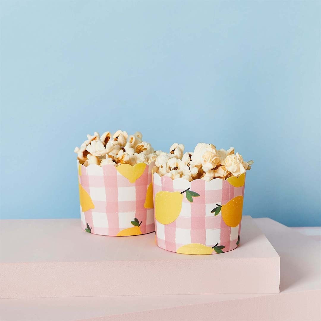 Lemon and pink gingham treat cups filled with popcorn