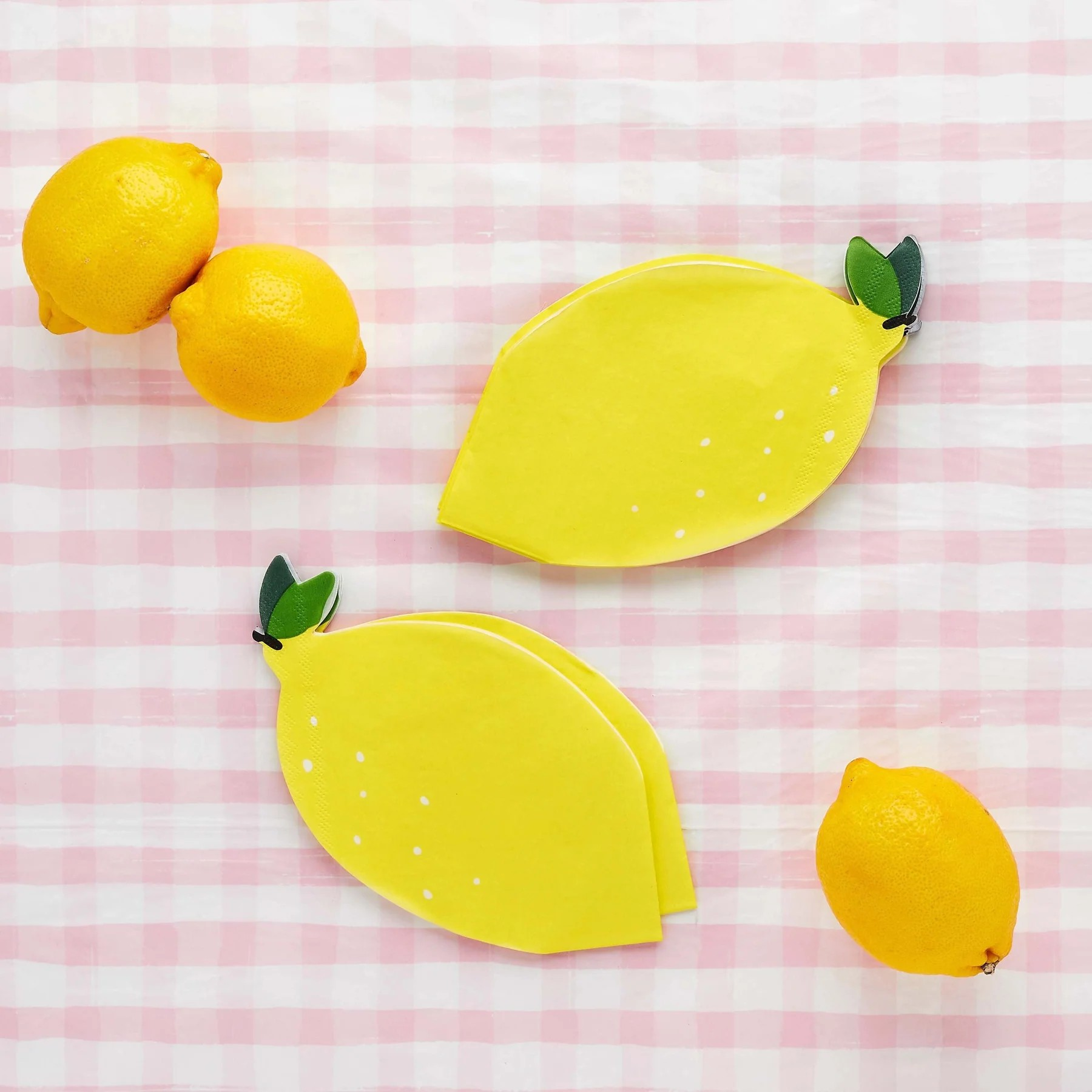 Lemon shaped paper napkins with green leaf detail