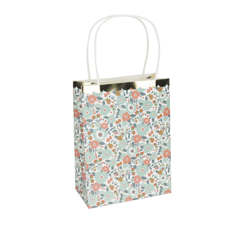 Margot floral and gold party bags with white raffia handles