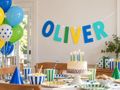 Giant personalised name banner above a birthday cake