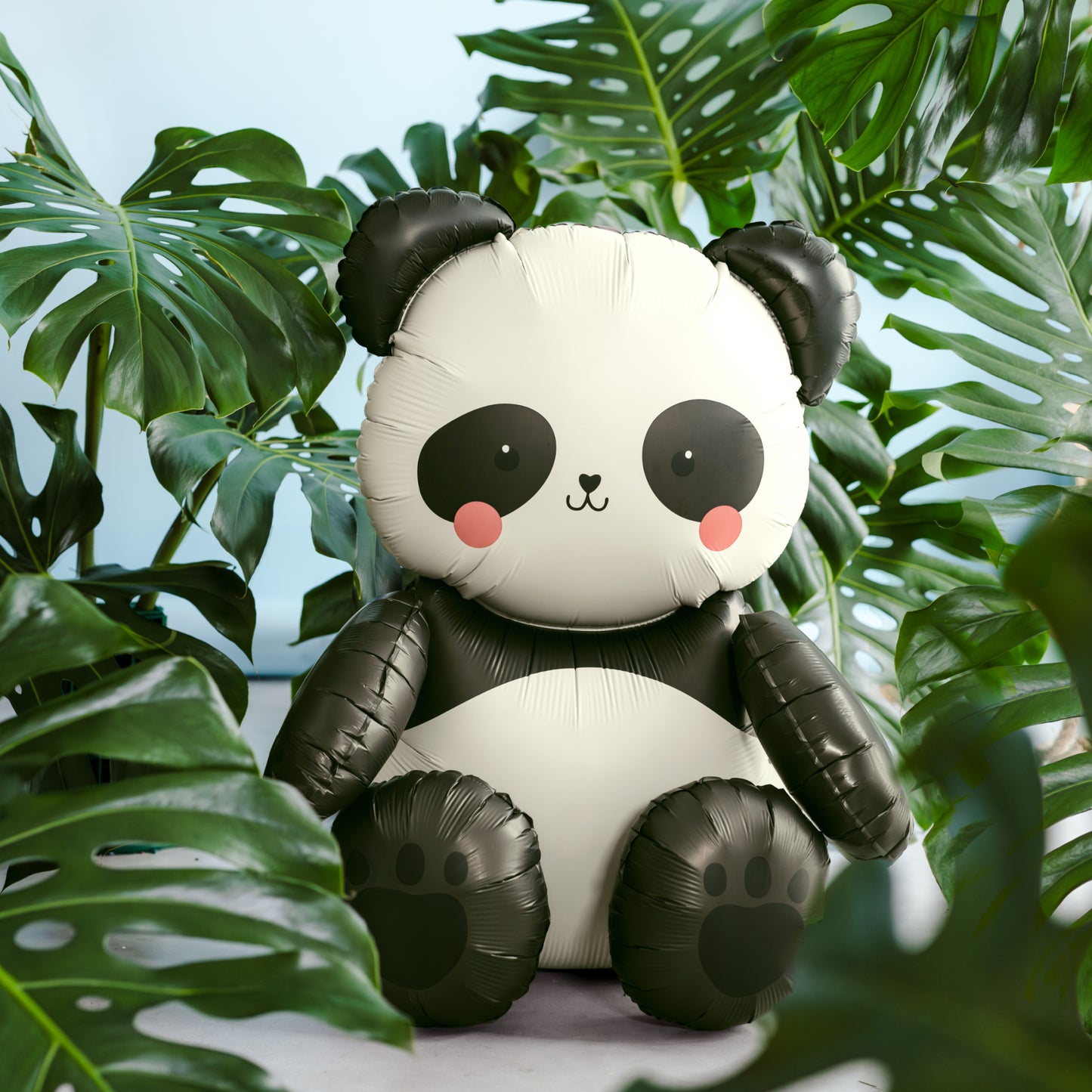 Standing panda foil balloon with black ears and paws sitting upright