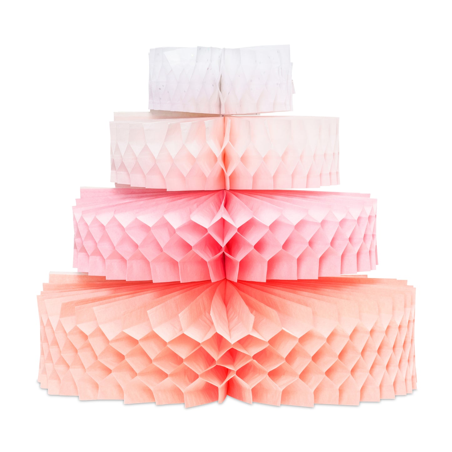 Pastel honeycomb paper cake decoration used as party table centrepiece