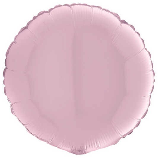 Pink round foil balloon on a white background