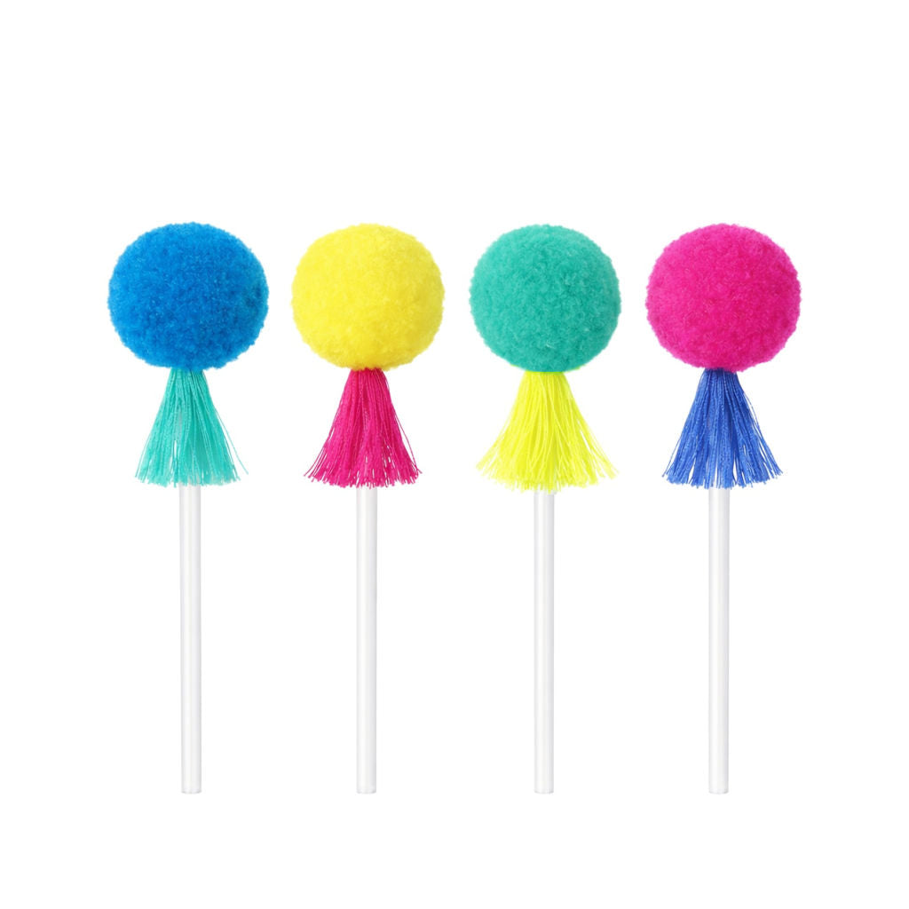 Neon pompom tassel cupcake picks in blue, yellow, teal and pink on white background
