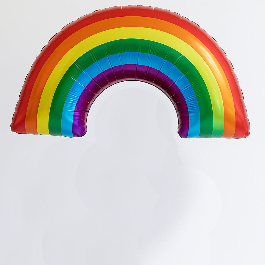 Rainbow-colored balloon shaped like a rainbow on a white background