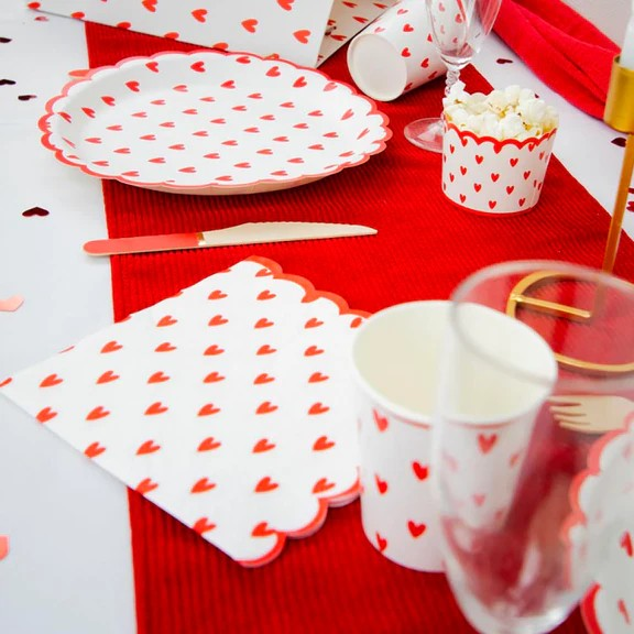 Paper plates with red hearts and red scalloped edge