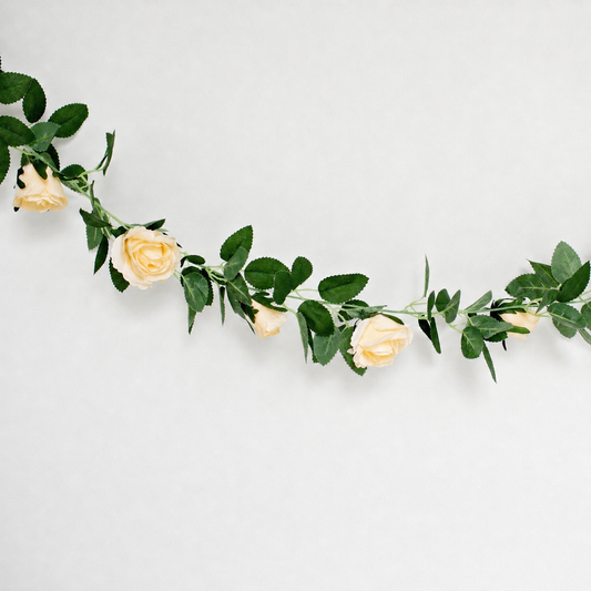 Faux Floral garland with champagne yellow flowers and green leaves