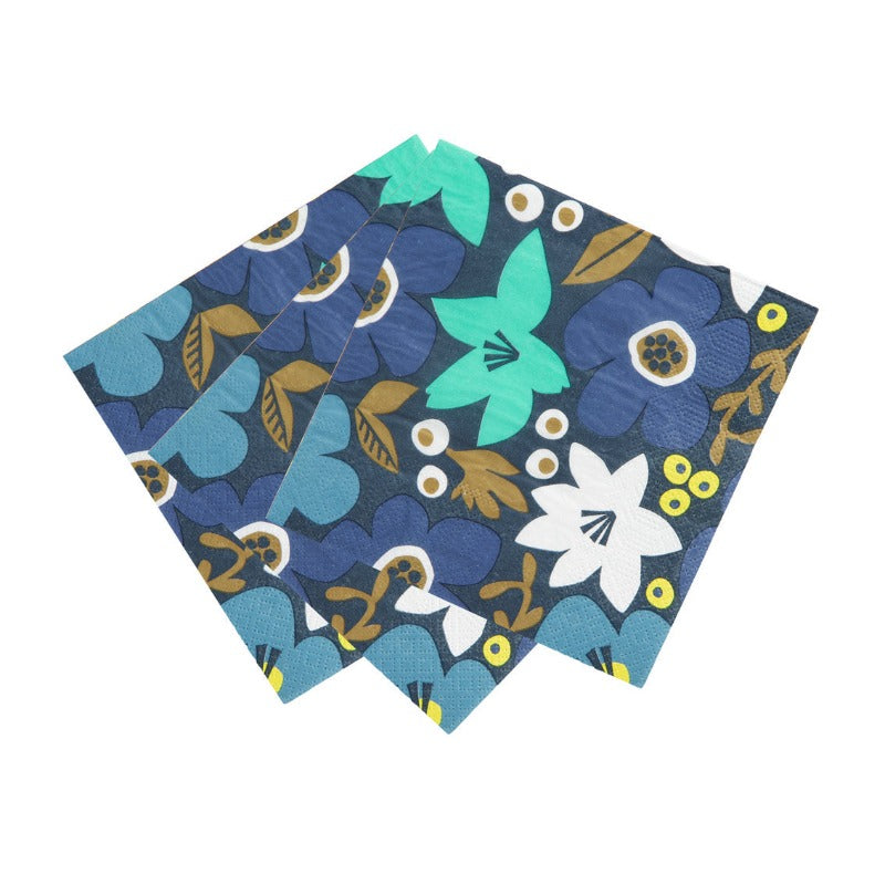 Gorgeous floral napkins in shades of blue, white and a touch of yellow. Retro vibes with a modern twist.