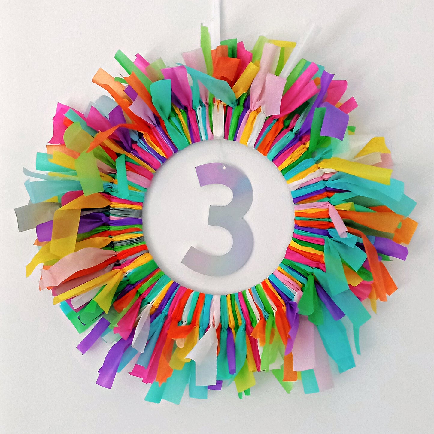 Personalised birthday door decoration with number, reusable eco-friendly wreath in bright colours.